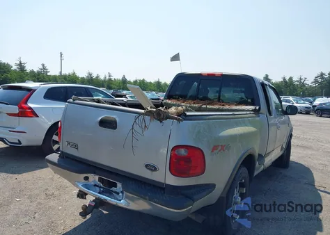 2002 Ford F-150 из США, поврежденный, VIN 02818101290994